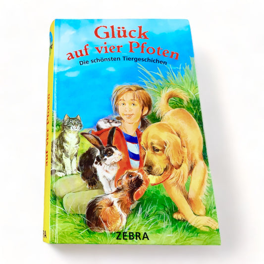 Buch „Glück auf vier Pfoten. Die schönsten Tiergeschichten"